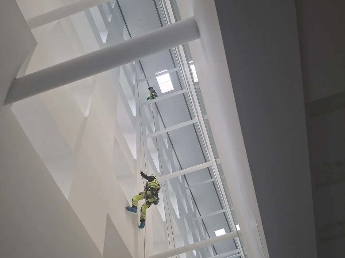 Internal atrium cleaning via rope access at Pilgrims Quarter